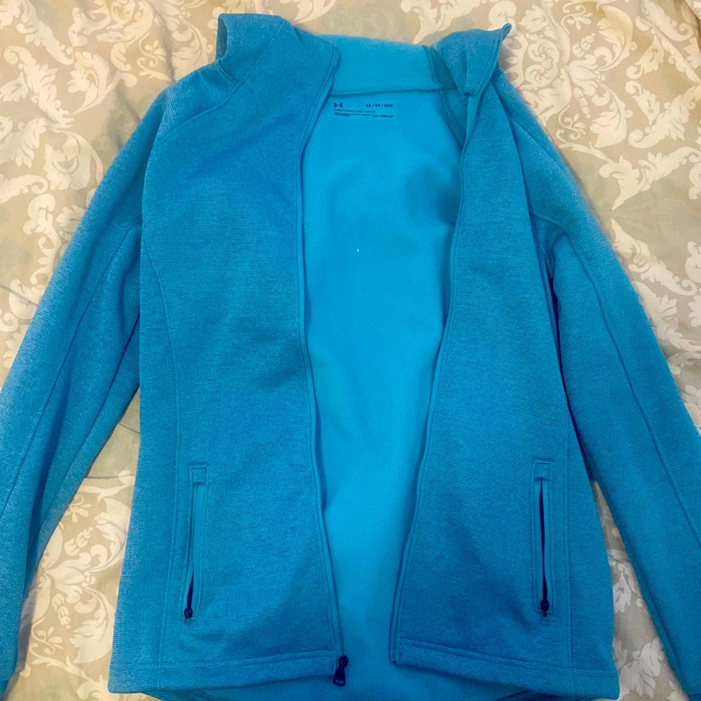 Electric blue under armour workout zip up with a hood,two pockets